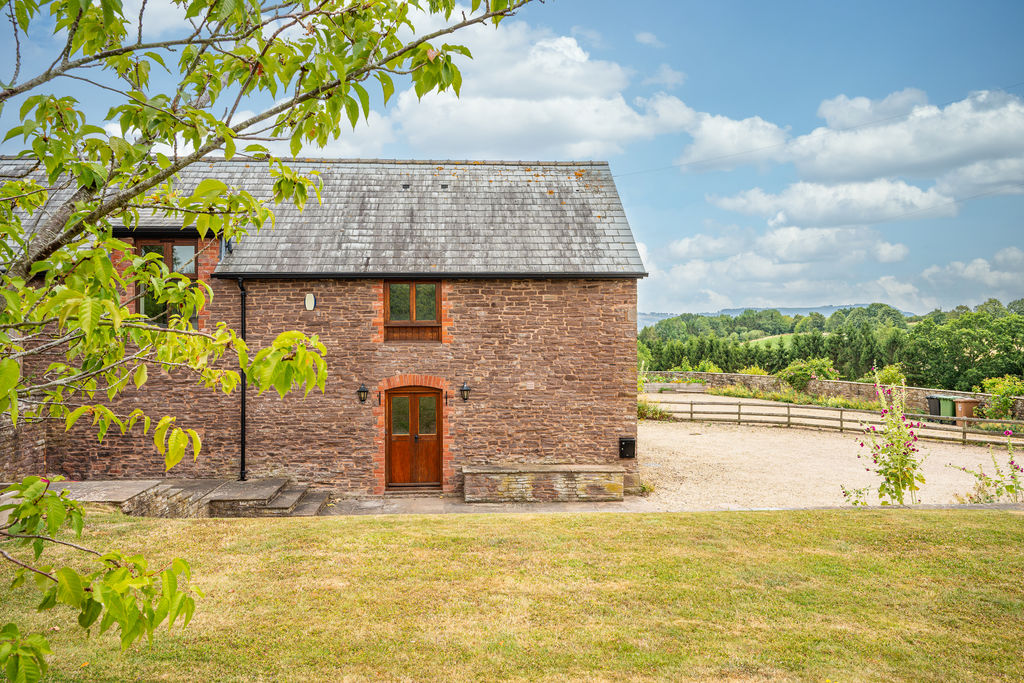 Front Elevation and Setting- click for photo gallery
